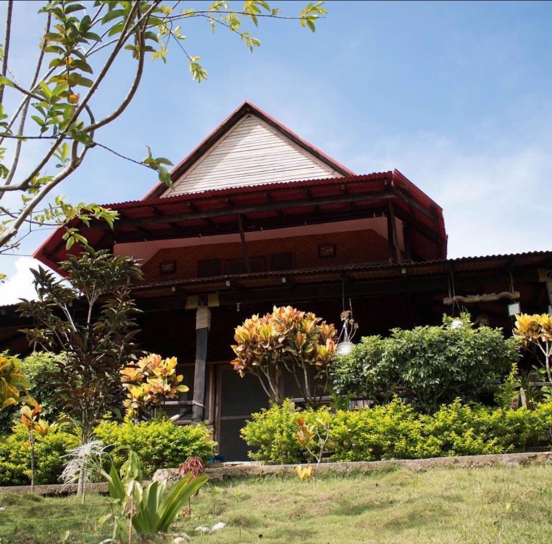 Hope Mountain main building surrounded by greenery